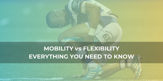 Rugby player kneeling on the field, holding his leg, representing the importance of mobility and flexibility for injury prevention and performance.